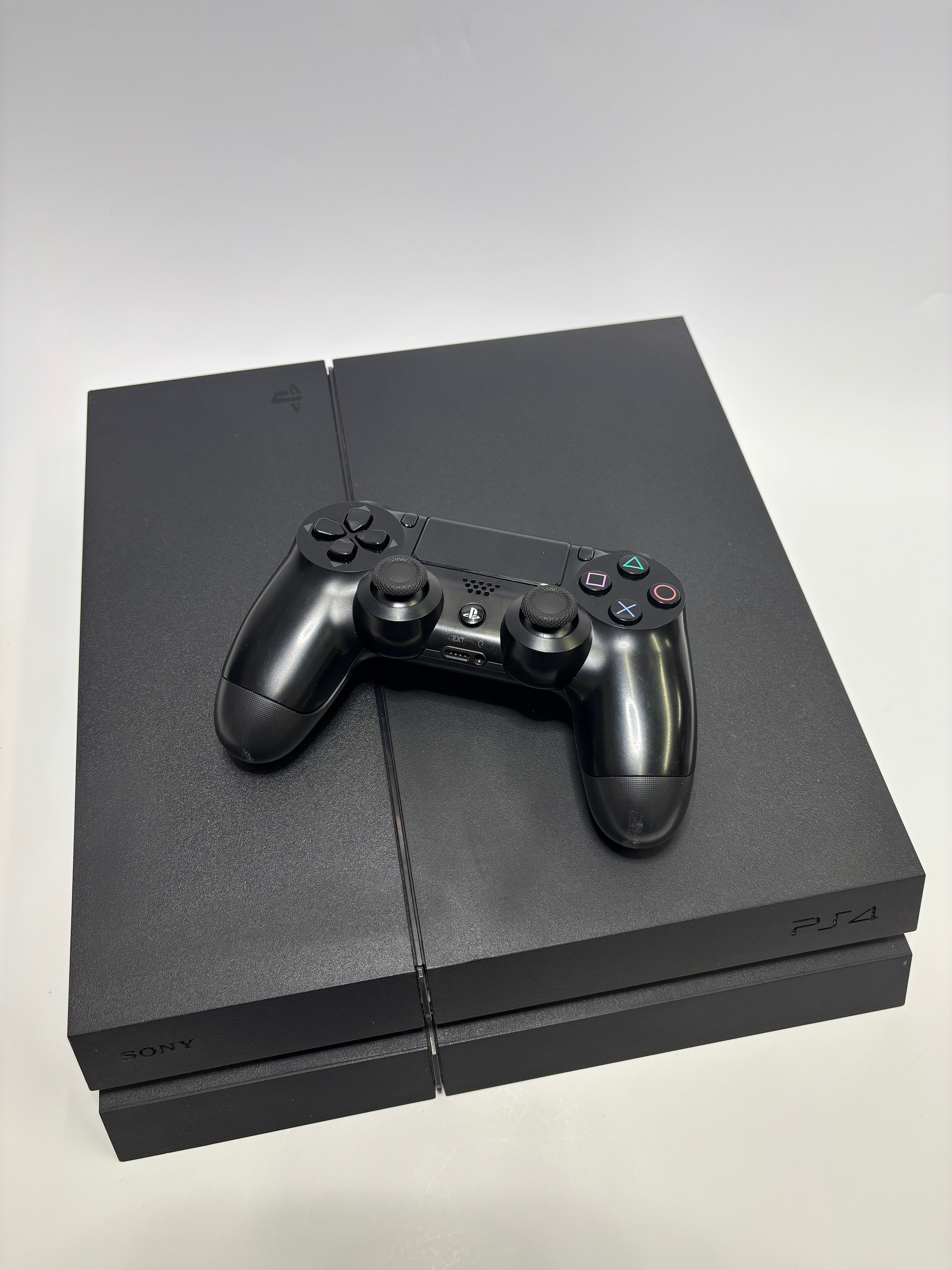 PlayStation 4 Console with DualShock 4 Controller — Black