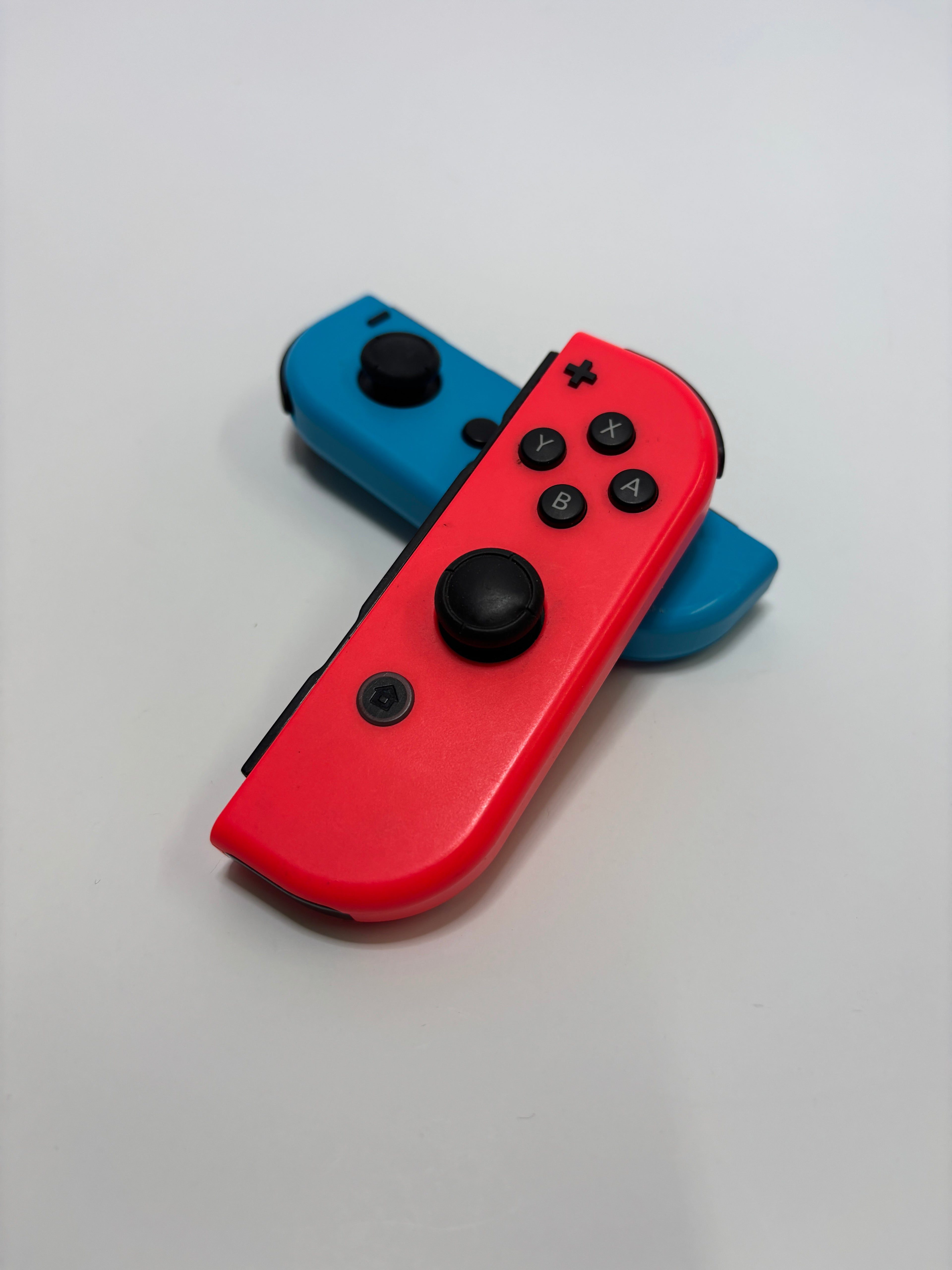 Nintendo Switch Joy-Con Pair — Neon Red/Blue